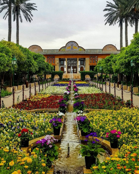 Lush garden with bitter orange trees at Narenjestan Garden
