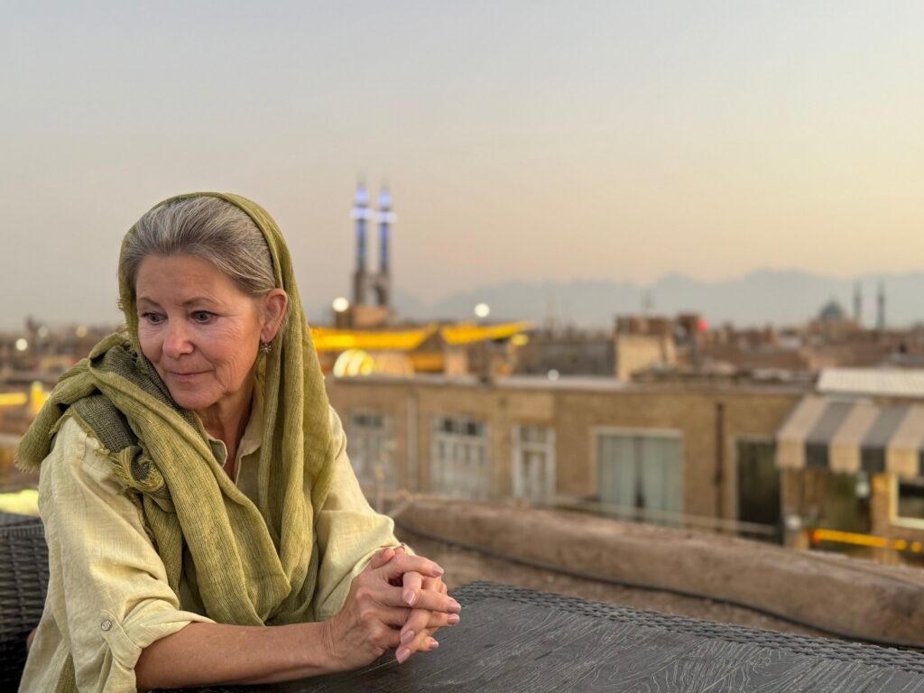 Female traveler following the dress code in Iran