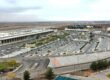 Mashhad International Airport exterior with airplane